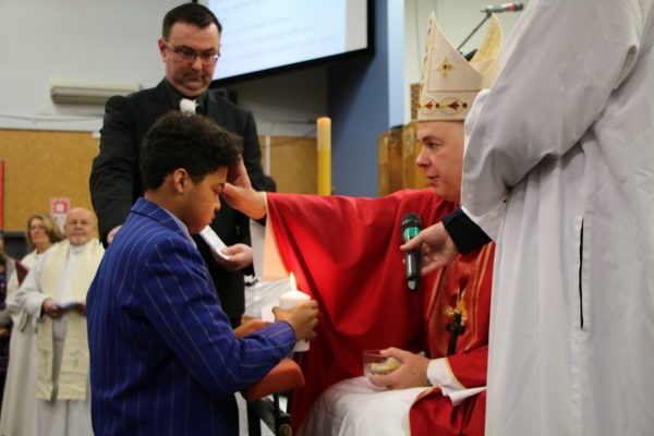 St Thomas of Canterbury student being confirmed
