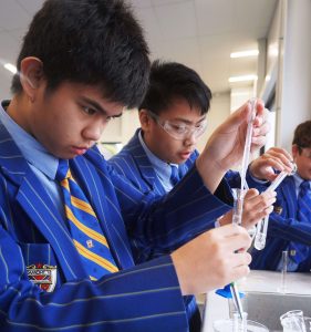 St Thomas of Canterbury College Boys doing science experiments