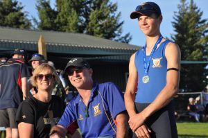 St Thomas of Canterbury College rowing boy wearing a medal