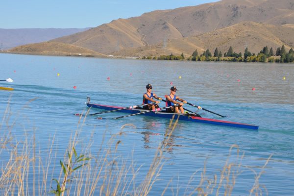 St Thomas of Canterbury College boys rowing on a lake